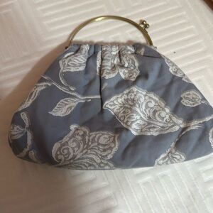 Fabric purse. Opens wide. Purchased from local artist in Tasmania Australia.